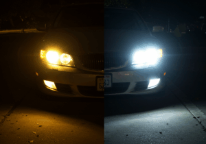 Car with bright LED headlights illuminating the road, showcasing improved visibility and modern front-end design.